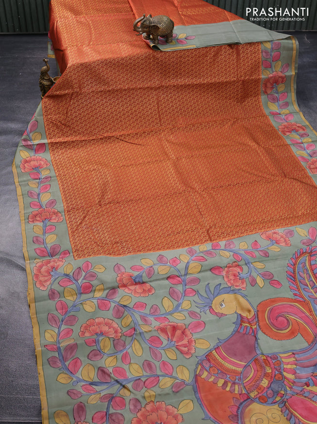 Pure kanchipuram silk saree rustic orange and grey shade with allover zari woven paisley brocade weaves and kalamkari printed pallu & border