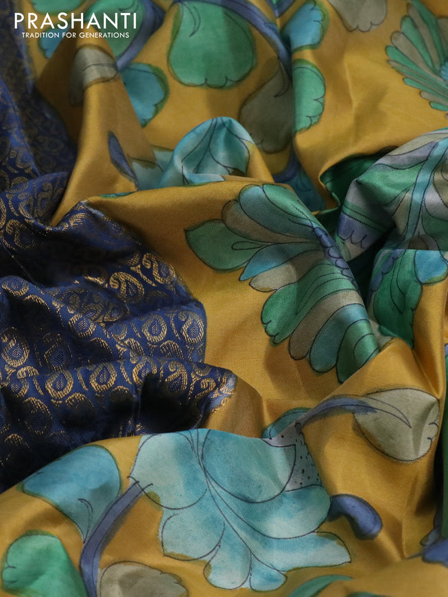 Pure kanchipuram silk saree blue shade and mustard yellow with allover zari woven paisley brocade weaves and kalamkari printed pallu & border