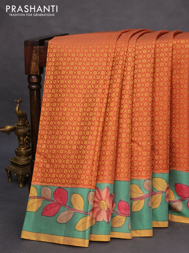 Pure kanchipuram silk saree rust shade and teal green with allover zari woven brocade weaves and kalamkari printed pallu & border