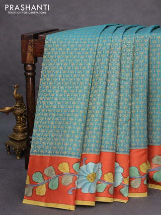 Pure kanchipuram silk saree teal blue shade and rustic orange with allover zari woven brocade weaves and kalamkari printed pallu & border