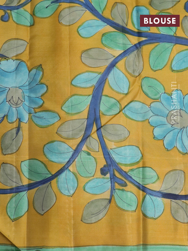 Pure kanchipuram silk saree blue shade and mustard yellow with allover zari woven geometric brocade weaves and kalamkari printed pallu & border