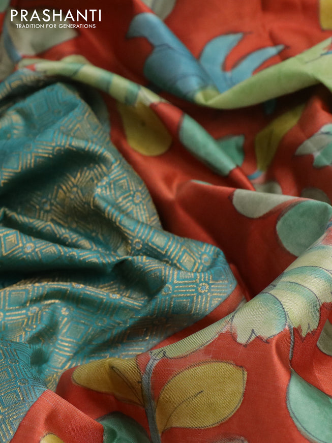 Pure kanchipuram silk saree teal blue and rustic orange with allover zari woven geometric brocade weaves and kalamkari printed pallu & border