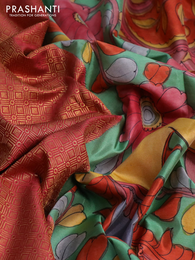 Pure kanchipuram silk saree dark peach shade and teal green shade with allover zari woven geometric brocade weaves and kalamkari printed pallu & border