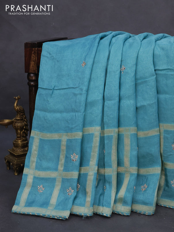 Satin crepe silk saree teal blue with mirror work buttas and zari checked & stone work border