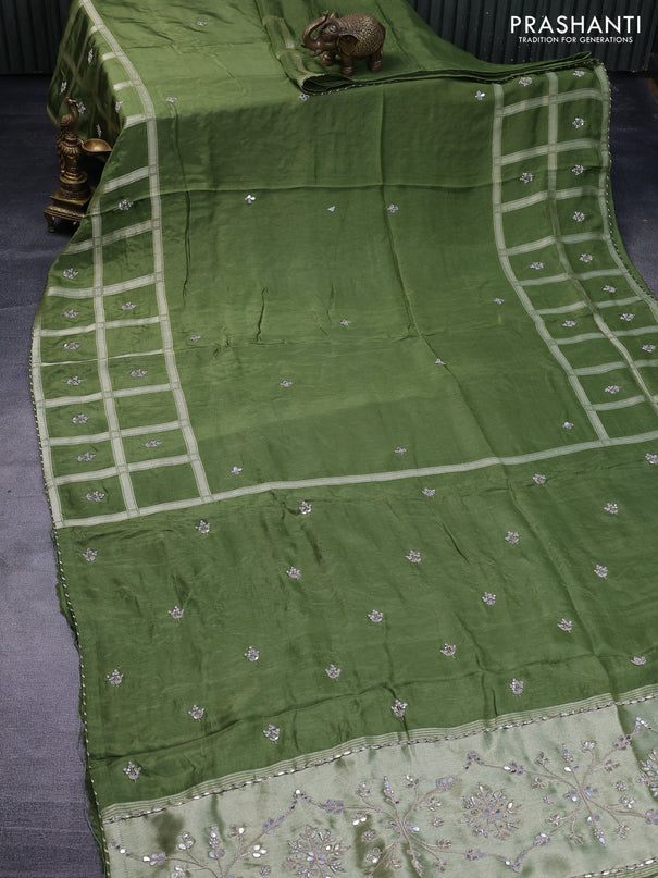 Satin crepe silk saree sap green with mirror work buttas and zari checked & stone work border