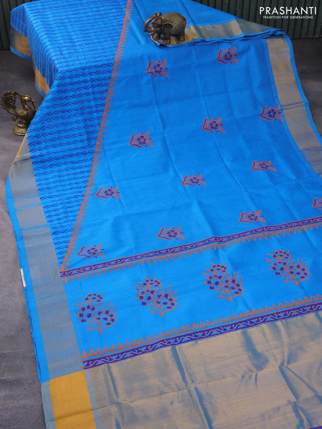 Silk cotton block printed saree cs blue with floral butta prints and zari woven border