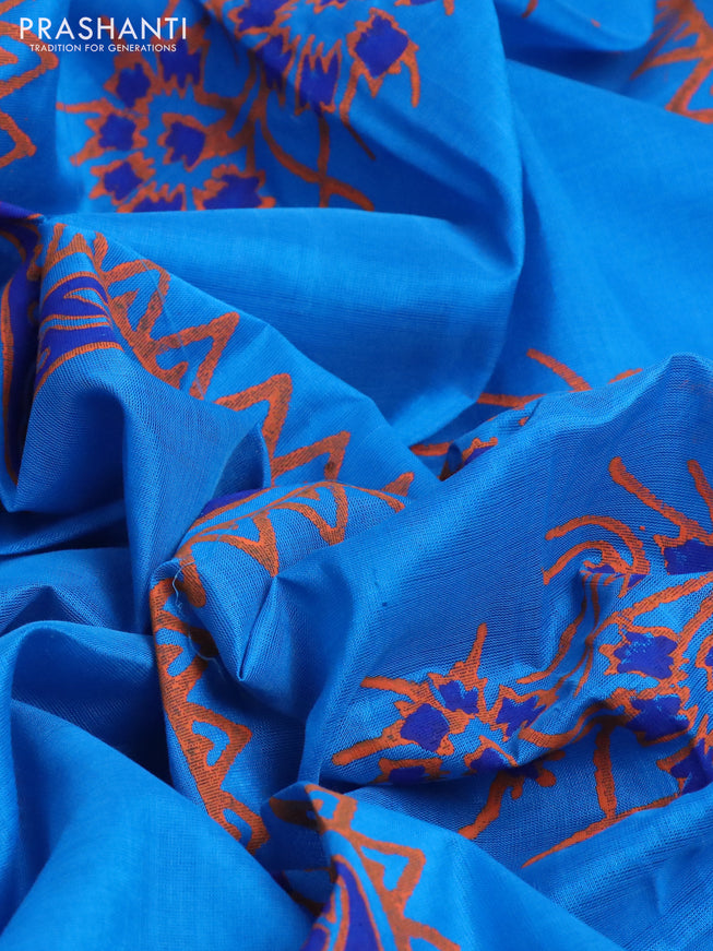 Silk cotton block printed saree cs blue with floral butta prints and zari woven border