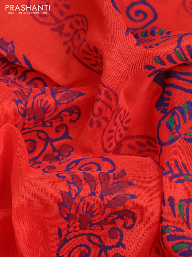 Silk cotton block printed saree orange with leaf butta prints and zari woven border