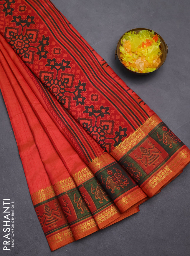 Semi tussar saree dual shade of pinkish orange with plain body and ikat woven zari border