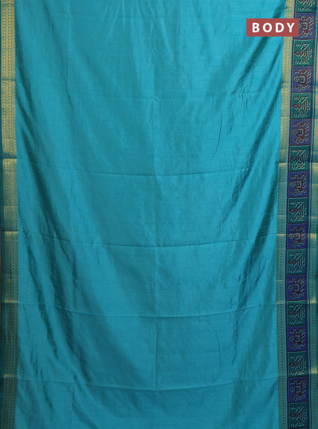 Semi tussar saree dual shade of teal blue with plain body and ikat woven zari border