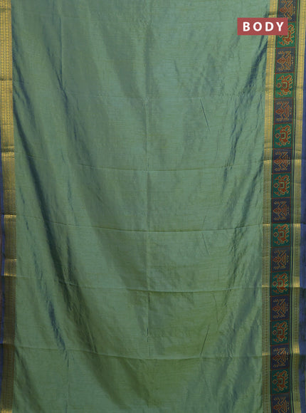 Semi tussar saree dual shade of greenish blue with plain body and ikat woven zari border