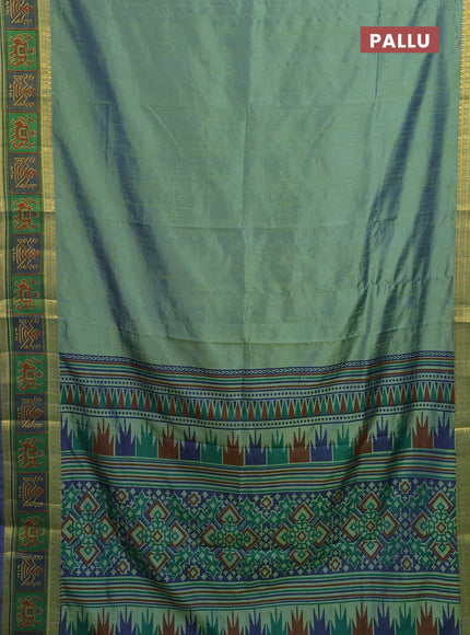 Semi tussar saree dual shade of greenish blue with plain body and ikat woven zari border
