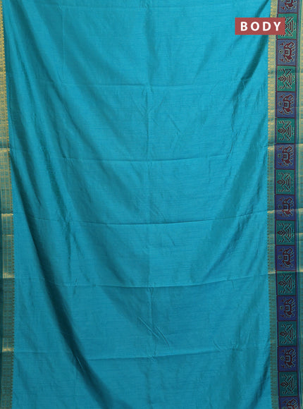 Semi tussar saree teal blue with plain body and ikat woven zari border