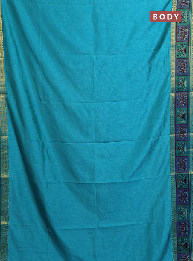 Semi tussar saree teal blue with plain body and ikat woven zari border