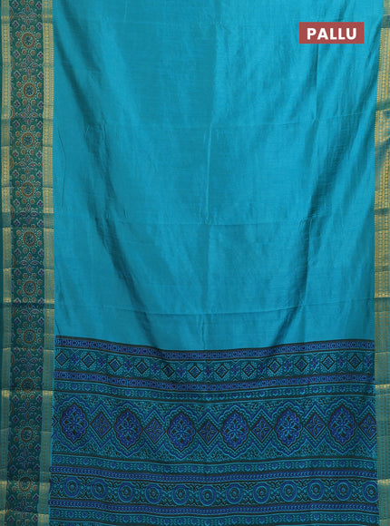 Semi tussar saree dual shade of teal blue with plain body and ikat woven zari border
