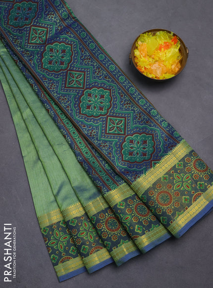 Semi tussar saree dual shade of green and blue with plain body and ikat woven zari border