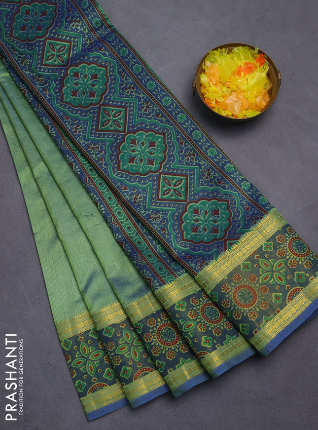 Semi tussar saree dual shade of green and blue with plain body and ikat woven zari border