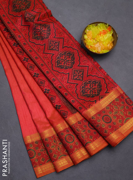 Semi tussar saree dual shade of pinkish orange with plain body and ikat woven zari border