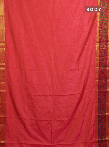 Semi tussar saree dual shade of pinkish orange with plain body and ikat woven zari border