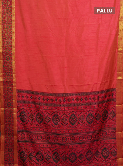 Semi tussar saree dual shade of pinkish orange with plain body and ikat woven zari border