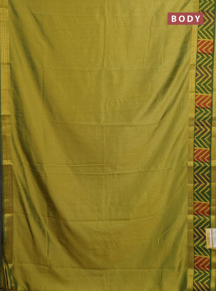 Semi tussar saree dual shade of light green with plain body and ikat woven zari border