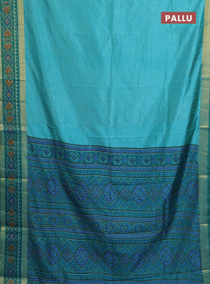 Semi tussar saree dual shade of teal blue with plain body and ikat woven zari border