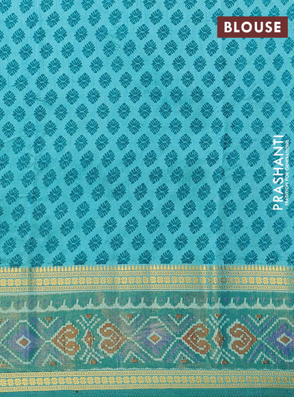 Semi tussar saree dual shade of teal blue with plain body and ikat woven zari border