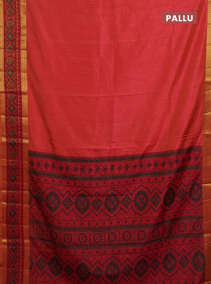 Semi tussar saree dual shade of pinkish orange with plain body and ikat woven zari border