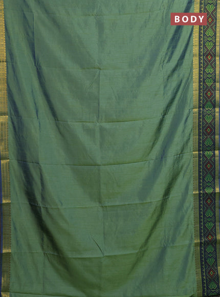 Semi tussar saree dual shade of greenish blue with plain body and ikat woven zari border