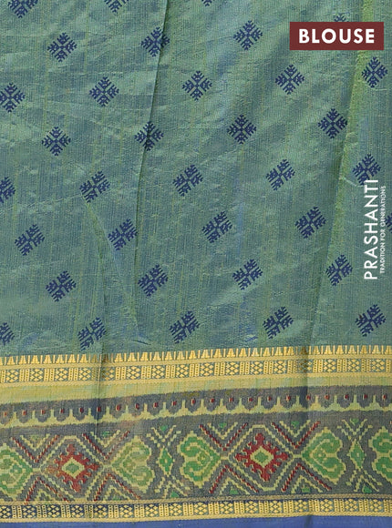 Semi tussar saree dual shade of greenish blue with plain body and ikat woven zari border