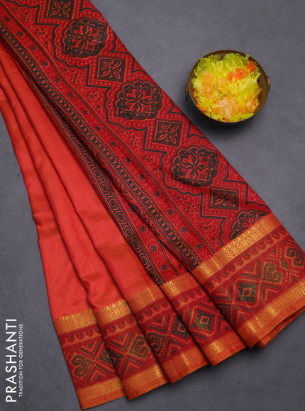 Semi tussar saree dual shade of pinkish orange with plain body and ikat woven zari border