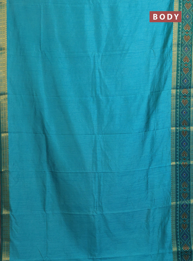 Semi tussar saree dual shade of teal blue with plain body and ikat woven zari border