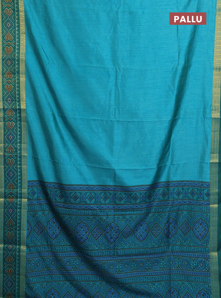 Semi tussar saree dual shade of teal blue with plain body and ikat woven zari border