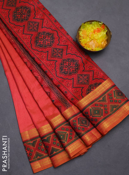 Semi tussar saree dual shade of pinkish orange with plain body and ikat woven zari border