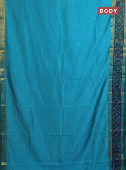 Semi tussar saree dual shade of teal blue with plain body and ikat woven zari border