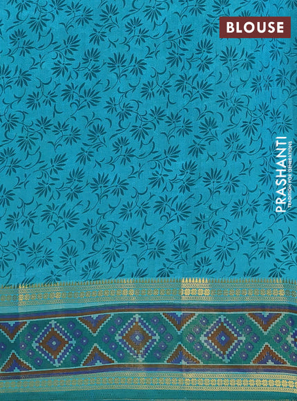 Semi tussar saree dual shade of teal blue with plain body and ikat woven zari border