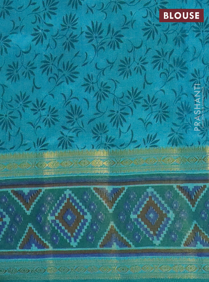 Semi tussar saree dual shade of teal blue with plain body and ikat woven zari border