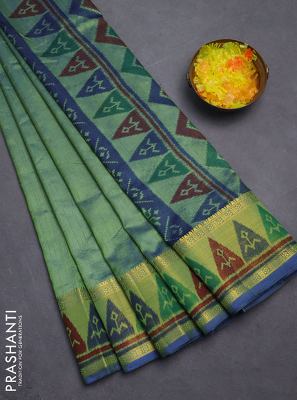 Semi tussar saree dual shade of greenish blue with plain body and ikat woven zari border