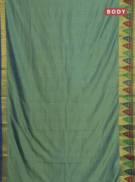 Semi tussar saree dual shade of greenish blue with plain body and ikat woven zari border
