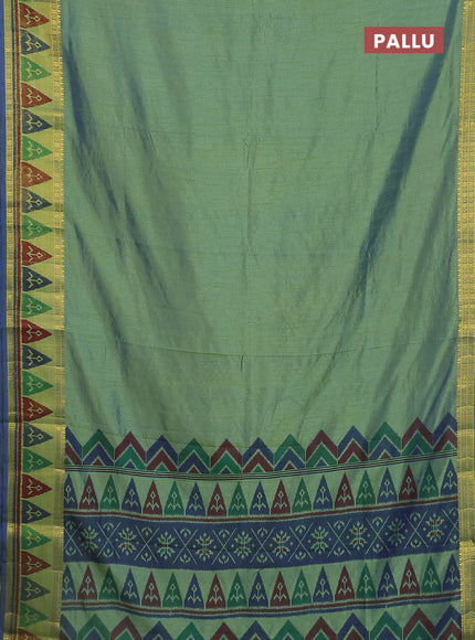 Semi tussar saree dual shade of greenish blue with plain body and ikat woven zari border