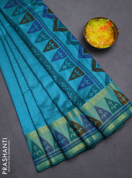 Semi tussar saree dual shade of teal blue with plain body and ikat woven zari border