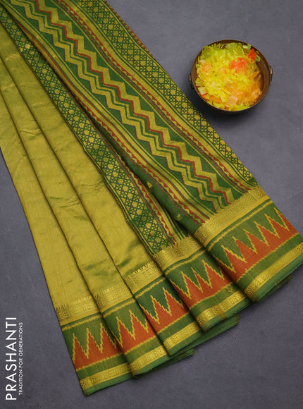 Semi tussar saree light green and green with plain body and ikat woven zari border