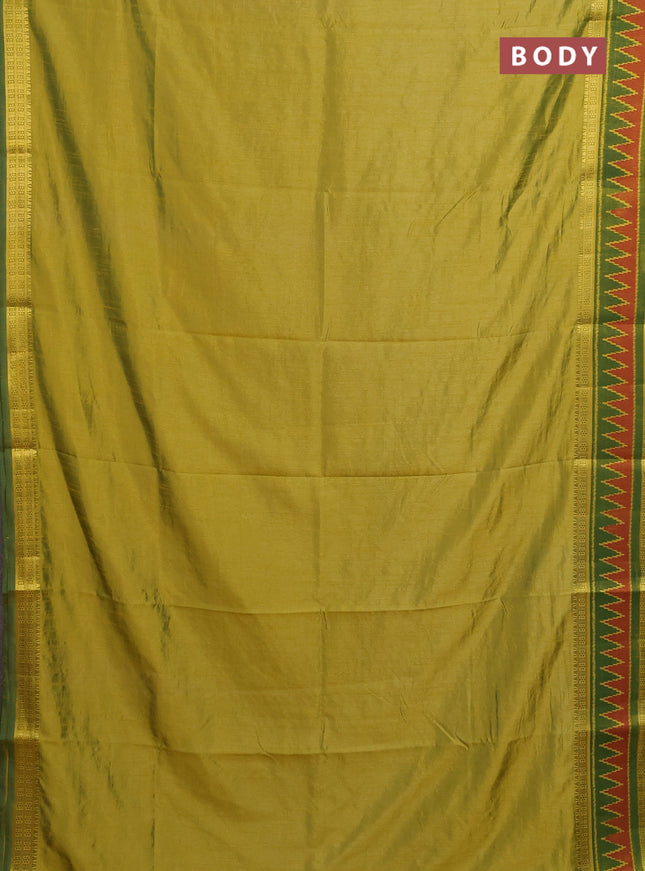 Semi tussar saree light green and green with plain body and ikat woven zari border