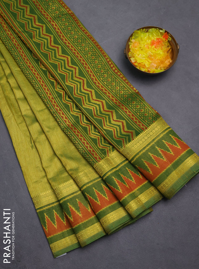Semi tussar saree light green and green with plain body and ikat woven zari border