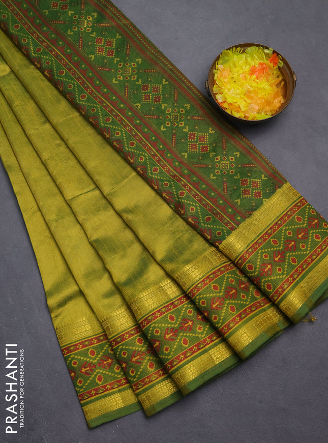 Semi tussar saree light green and green with plain body and ikat woven zari border