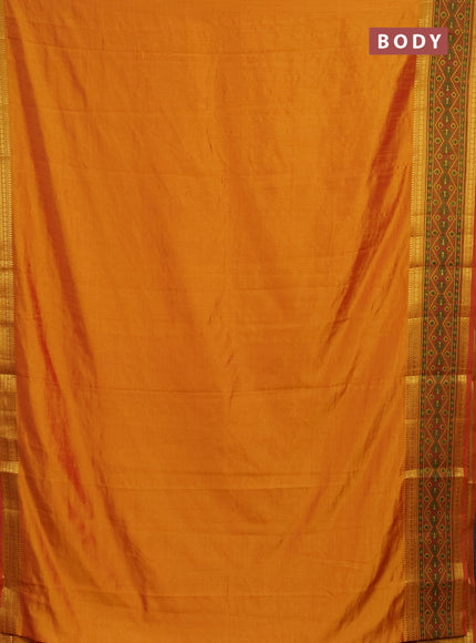 Semi tussar saree dual shade of mustard yellow and red with plain body and ikat woven zari border