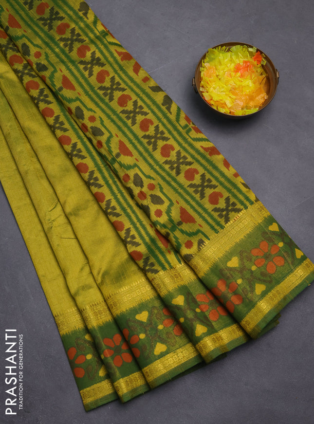 Semi tussar saree dual shade of light green and green with plain body and ikat woven zari border