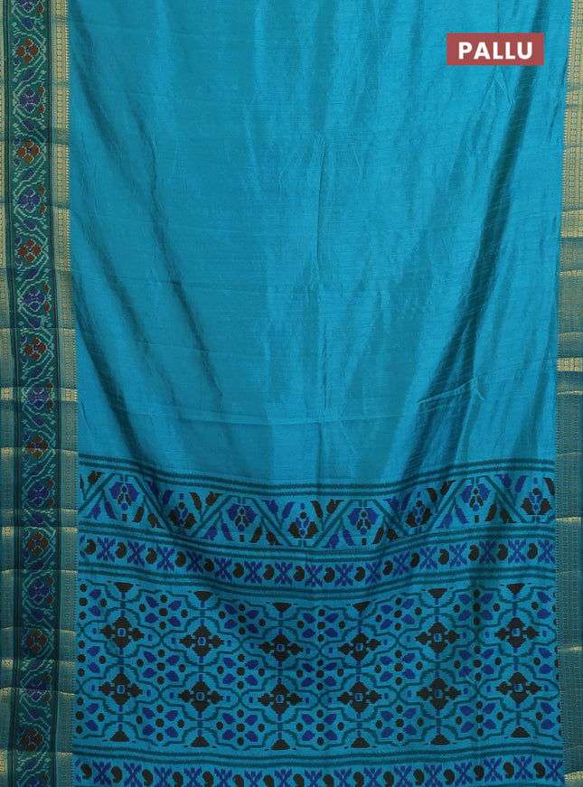 Semi tussar saree dual shade of teal blue and teal green with plain body and ikat woven zari border