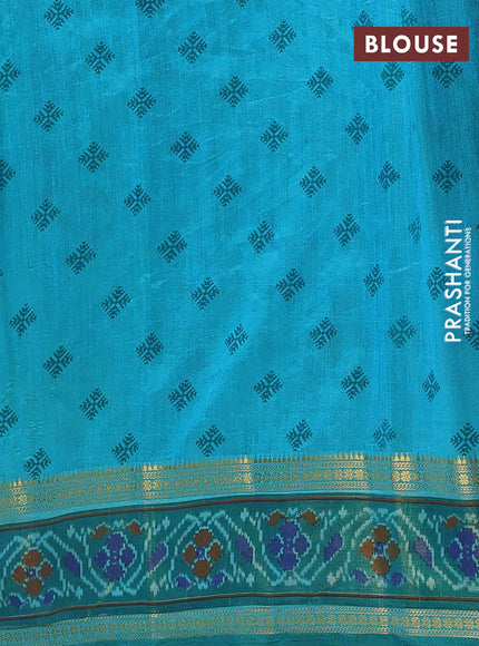 Semi tussar saree dual shade of teal blue and teal green with plain body and ikat woven zari border