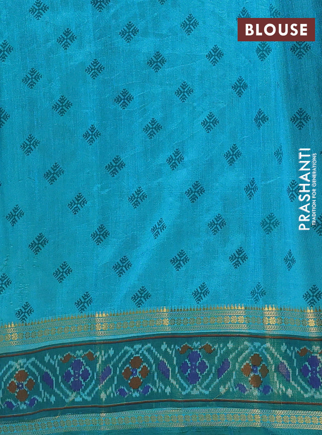 Semi tussar saree dual shade of teal blue and teal green with plain body and ikat woven zari border